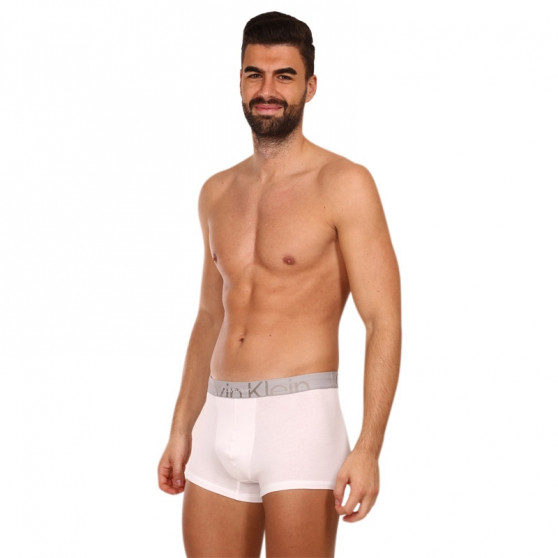 Vyriški boksininkų šortai Calvin Klein balti (NB3299A-100)