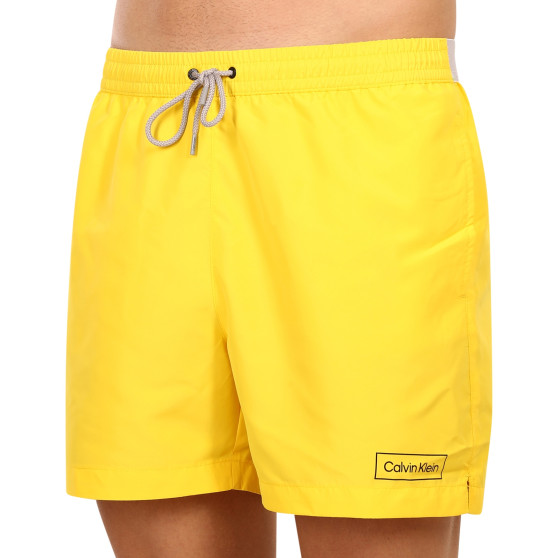 Vyriški maudymosi kostiumėliai Calvin Klein yellow (KM0KM00787 ZGR)