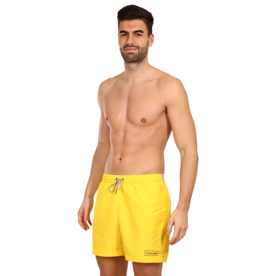 Vyriški maudymosi kostiumėliai Calvin Klein yellow (KM0KM00787 ZGR)