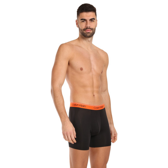 3PACK Vyriški boksininko šortai Calvin Klein juodi (NB2570A-GTK)