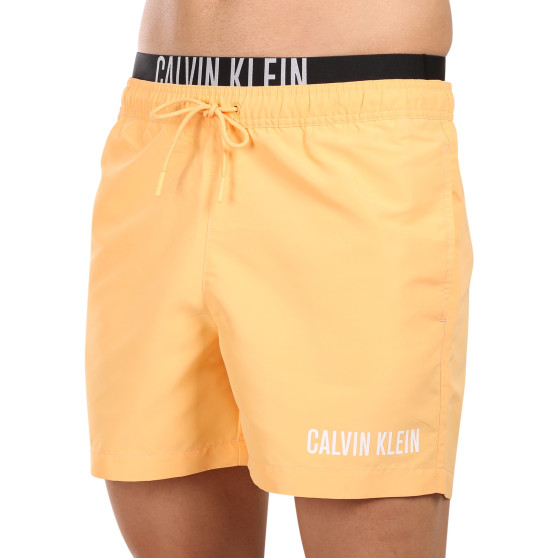 Vyriški maudymosi kostiumėliai Calvin Klein orange (KM0KM00992-SAN)