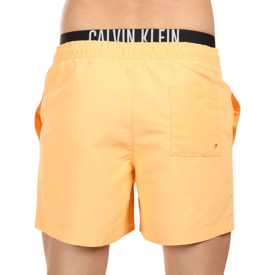 Vyriški maudymosi kostiumėliai Calvin Klein orange (KM0KM00992-SAN)