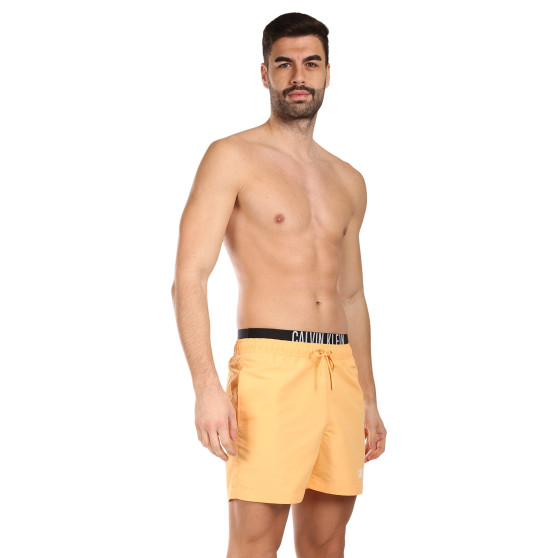 Vyriški maudymosi kostiumėliai Calvin Klein orange (KM0KM00992-SAN)