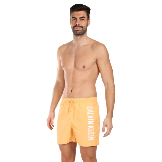 Vyriški maudymosi kostiumėliai Calvin Klein orange (KM0KM01004-SAN)